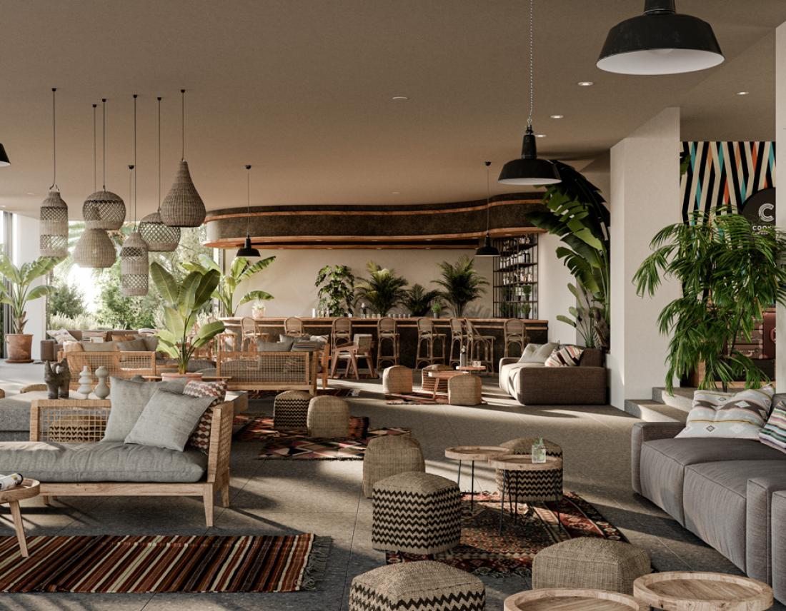 Wohnzimmer im Boho-Design mit Sofas, Höckern und viel Pflanzen um Cook's Club Corfu