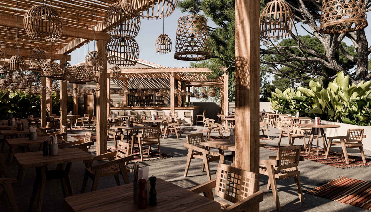 Outdoor Restaurant im Cook's Club Corfu mit vielen Holzmöbeln, Sonnendach und Pflanzen